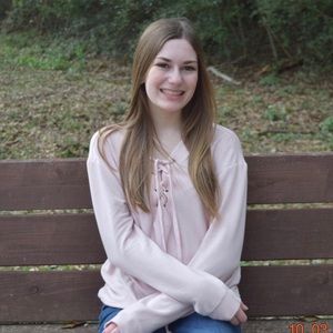 A light pink cross up shirt from GARAGE